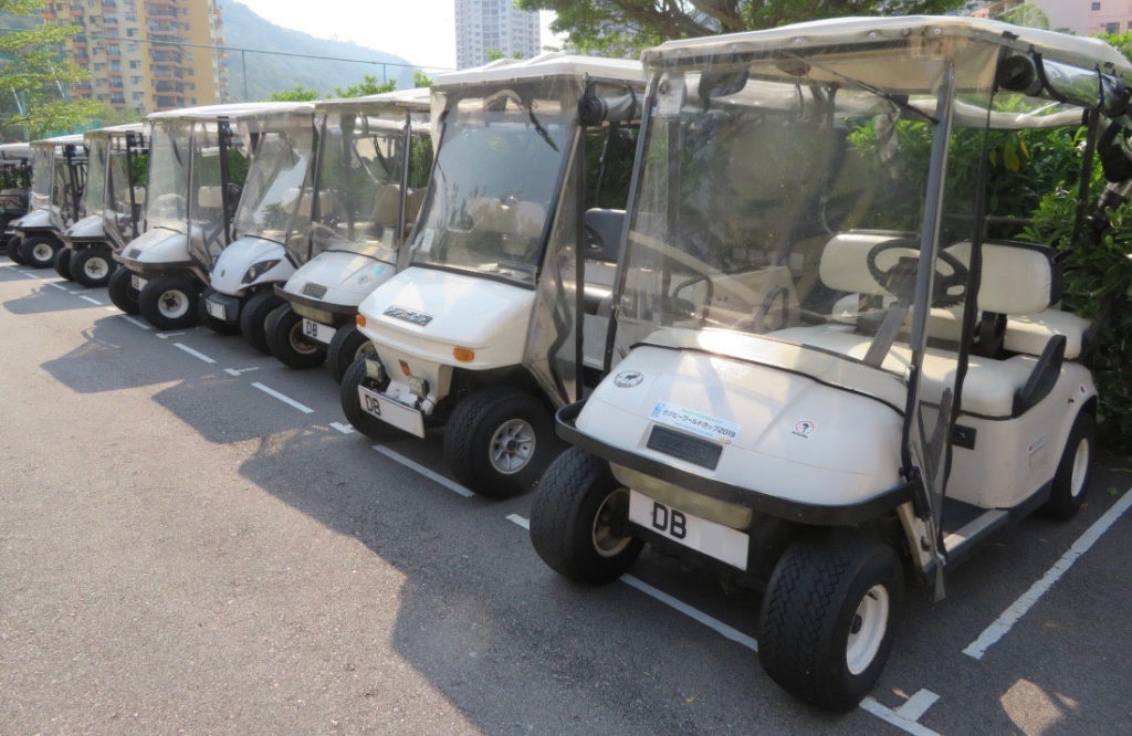 Ferrari-price golf buggy: Golf carts parked in Discovery Bay, Hong Kong