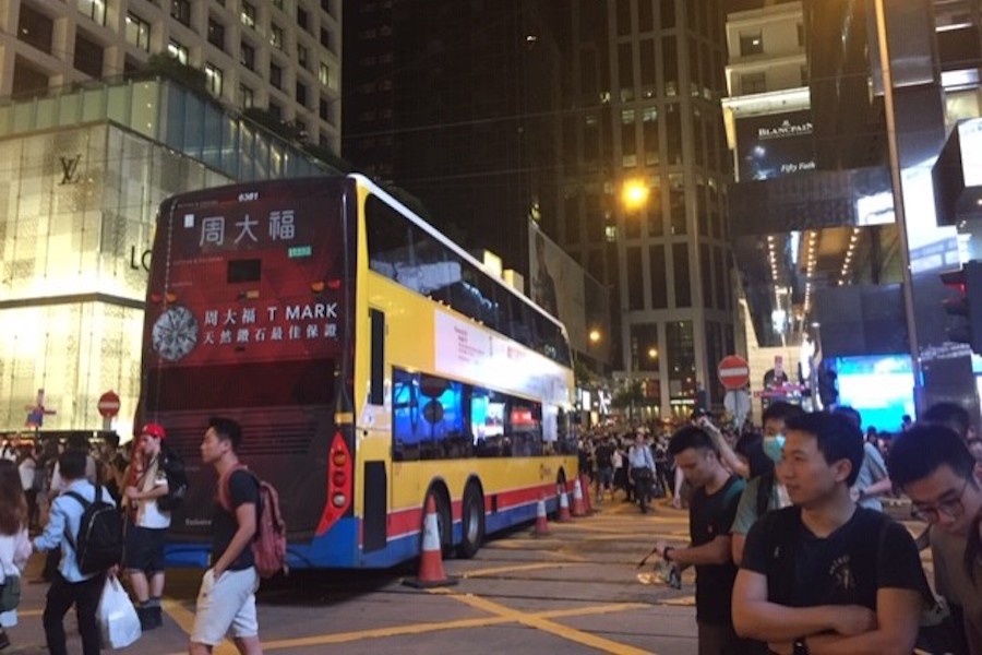 A bus gets surrounded in Central
