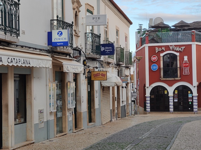 Deserted street, shuttered bars