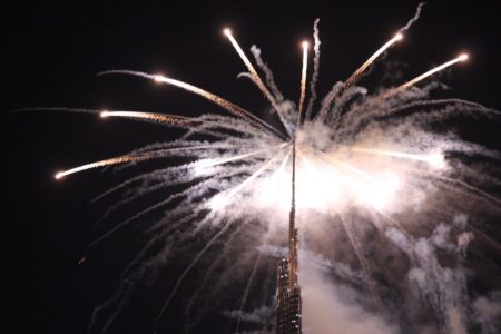 Tower: Fireworks burst from the top of the Burj during opening ceremony